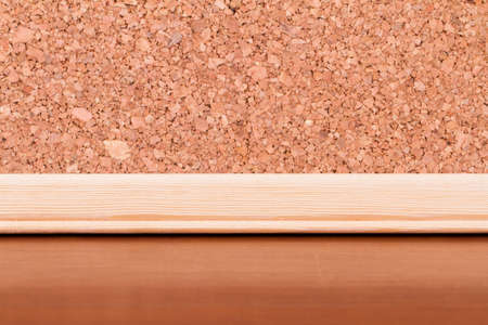 Cork board for your message at background on wooden table.の写真素材