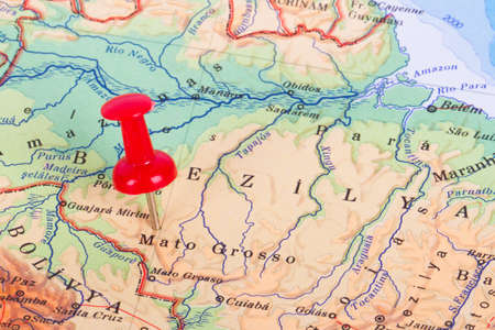 Close up view of red pushpin on map.の写真素材