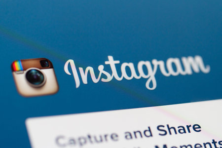 ISTANBUL, TURKEY - MARCH 16, 2013: Photo of Instagram.com home page with logo on tablet.  Instagram...
