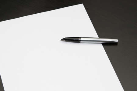 Black fountain pen on sheet.の写真素材