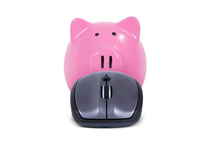 Computer mouse and pink piggy bank, isolated on white background.の写真素材