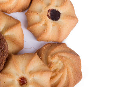 Heap of biscuit cookie chips, isolated on white background.の写真素材