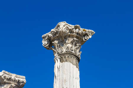 Columns and ruins on ancient city on blue sky background.の写真素材