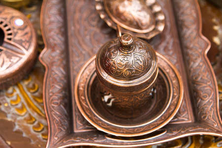 Copper Turkish coffee cup on service.の写真素材