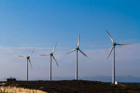 Group of winmills, wind turbines for renewable energy.の写真素材