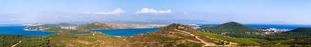 Panoramic view of environment with sea and hills.の写真素材