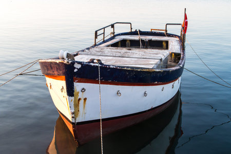Front view of small boat on sea.の写真素材