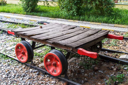 Wagonette on railway with red wheels.の写真素材