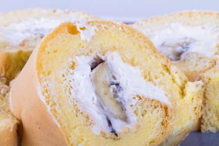 Close up view of sliced banana tasty cake in plate.の写真素材