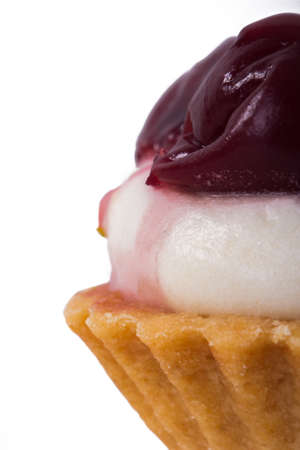 Close up view of single strawberry tasty cake, isolated on white background.の写真素材