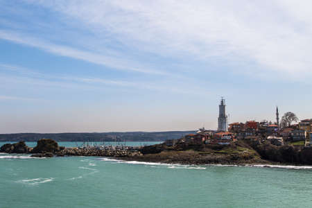 Rumeli Lighthouse from castle on cloudy sky at seascape.のeditorial素材