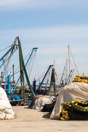 ISTANBUL, TURKEY - APRIL 12, 2015: Close up front view of fishing boats, fishermen with their nets and ropes.のeditorial素材