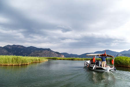 DALYAN, TURKEY - MAY 31, 2015 : Touristic boat trips in the river between Koycegiz Lake and Iztuzu Beach in Dalyan.のeditorial素材