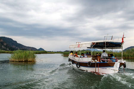 DALYAN, TURKEY - MAY 31, 2015 : Touristic boat trips in the river between Koycegiz Lake and Iztuzu Beach in Dalyan.のeditorial素材
