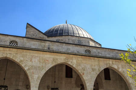Close up bottom view of the dome of historical Habibi Neccar Mosque, on blue sky background.の写真素材