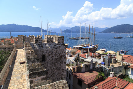 MUGLA, TURKEY - JUNE 1, 2015 : View of Marmaris town and marina from old historical Marmaris Tower, on blue sky background.のeditorial素材