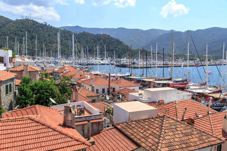MUGLA, TURKEY - JUNE 1, 2015 : Top view of Marmaris Marina among mountains with sailing boats and yatches anchored, on blue sky background.のeditorial素材