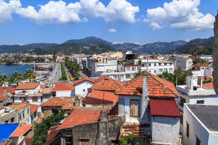 MUGLA, TURKEY - JUNE 1, 2015 : Top view of Marmaris town, roofs of the old houses, on cloudy sky background.のeditorial素材