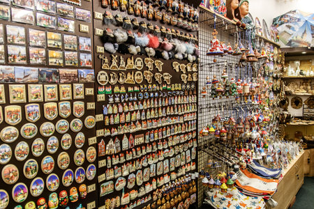TALLINN, ESTONIA - APRIL 25, 2015 : Close up interior view of small souvenir shop with magnets, mugs, caps and bibelots in Tallinn, Estonia.のeditorial素材