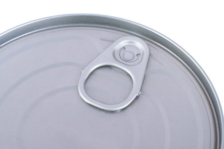 Close up detailed top view of metal grey tin can with ring pull, isolated on white background.