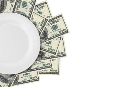 Close up top view of white porcelain flat plate on one hundred dollar banknotes, isolated on white background.の写真素材