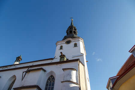 Close up detailed bottom view of the cathedral church of St Mary's located in Toompea Hill, in Tallinn, Estonia, on blue sky background.の写真素材