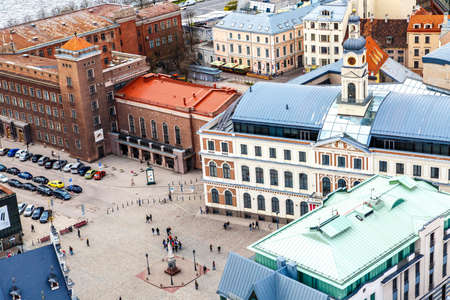 RIGA, LATVIA - MAY 2, 2015 : Top view of a square with building around where people are hanging around, in Riga Latvia.のeditorial素材