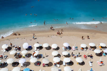 ANTALYA, TURKEY - JULY 19, 2015 : Top view of famous canyon junction beach of Antalya, Kaputas Beach with its turquoise water color, view of people swimming and sunbathing.のeditorial素材