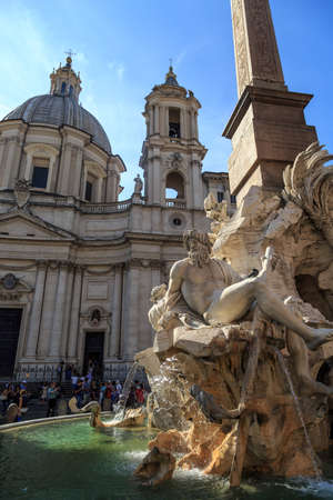 ROME, ITALY - SEPTEMBER 23, 2015 : Close up detaled view of Piazza Navona, with pleople hanging around the fountain with scuptures, on bright blue weather background.のeditorial素材