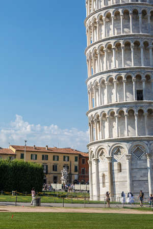 PISA, ITALY - SEPTEMBER 21, 2015 : View of historical Pisa Tower in Cathedral Square of Pisa, Italy, on bright blue sky background.のeditorial素材
