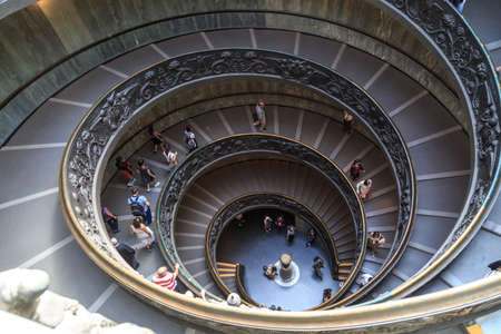 ROME, ITALY - SEPTEMBER 25, 2016 : Top view of famous stairs with round shape at Vatican Museum.のeditorial素材