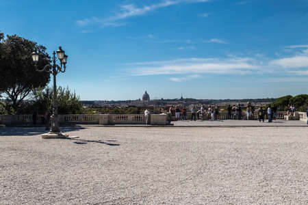 ROME, ITALY - SEPTEMBER 23, 2015 : Close up view of a big garden with pebbles on the ground, on cloudy blue sky background.のeditorial素材