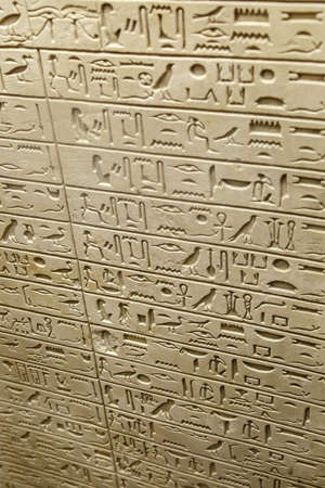 FLORENCE, ITALY - SEPTEMBER 20, 2015 : Close up detailed view of egyptian tablet inscriptions with hieroglyphic signs exhibited in Florence Archeology Museum.のeditorial素材