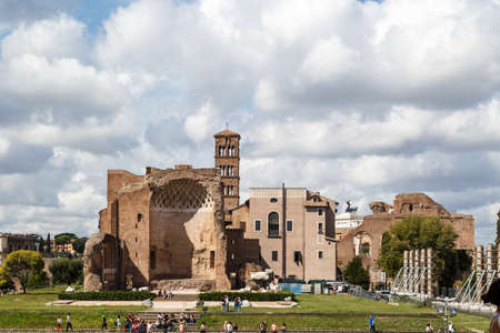 ROME, ITALY - SEPTEMBER 24, 2015 : View of archeological area of ancient Roman Forum in Rome, on cloudy blue sky background.のeditorial素材