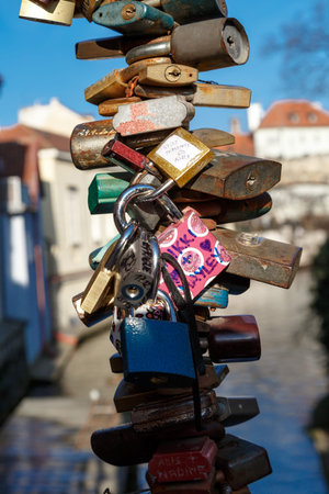 PRAGUE, CZECH REPUBLIC - DECEMBER 31, 2015 : Close up detailed view of love padlocks on a bridge in...