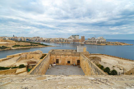 VALLETTA, MALTA - OCTOBER 30, 2015 : General view of Valletta, Malta island with seascape, port and historical limestone buildings from medieval times.のeditorial素材