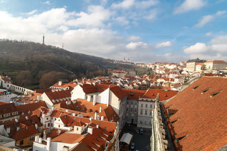 PRAGUE, CZECH REPUBLIC - DECEMBER 31, 2015 : General top view of Prague cityscape view with historical gothic buildings around, on cloudy sky background.のeditorial素材