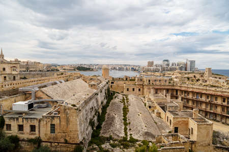 General view of Valletta cityscape at Malta island with historical limestone buildings from medieval times.の写真素材