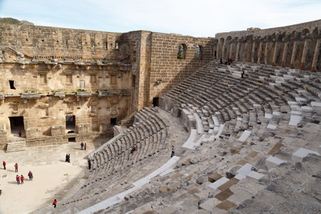 ANTALYA, TURKEY - MARCH 7, 2016 : View of amphitheater with historical old granit stairs in Aspendos Ancient City.のeditorial素材