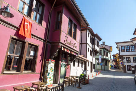 ESKISEHIR, TURKEY - APRIL 17, 2016 : General view of historical old colorful Odunpazari houses and pathway on blue sky background.のeditorial素材