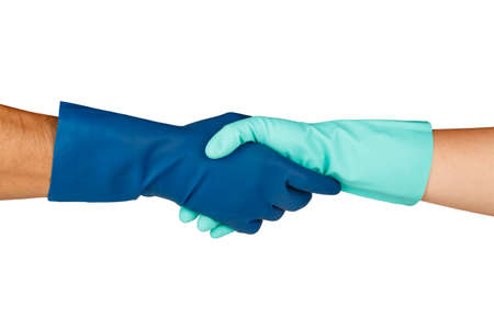 Close up view of hands with rubber glove handshaking, isolated on white background.の写真素材