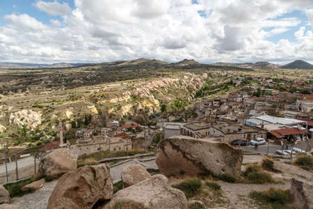 NEVSEHIR, TURKEY - MAY 7, 2016 : Cappadocia view from Uchisar Castle which is the highest building of the area on cloudy sky background.のeditorial素材
