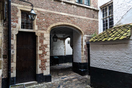 ANTWERP, BELGIUM - JULY 5, 2016 : Vlaeykensgang is small and tight medieval alley in the center of Antwerp.のeditorial素材