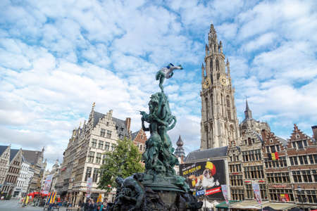 ANTWERP, BELGIUM - JULY 5, 2016 : Belfry tower in Antwerp old town on cloudy sky. Antwerp is the capital city in the region of Flanders, Belgiumのeditorial素材