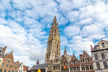 ANTWERP, BELGIUM - JULY 5, 2016 : Belfry tower in Antwerp old town on cloudy sky. Antwerp is the capital city in the region of Flanders, Belgiumのeditorial素材