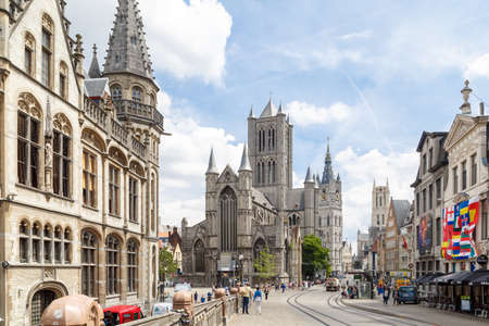GENT, BELGIUM - JULY 6, 2016 : Korenmarkt, St Nicholas Church and St Bavo Cathedral in same composition from St Michael Bridge. Gent is popular place in Belgium.のeditorial素材