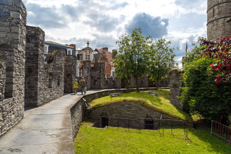 Interior view of medieval castle named Gravenstreen (Castle of the Counts) in Ghent, Belgium on cloudy sky.の写真素材