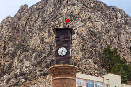 AMASYA, TURKEY - DECEMBER 03, 2016 : Old Ottoman houses and historical clock tower by the Yesilirmak River. Amasya has been a popular hometown for sultan's sons for all Ottoman Empire period.のeditorial素材