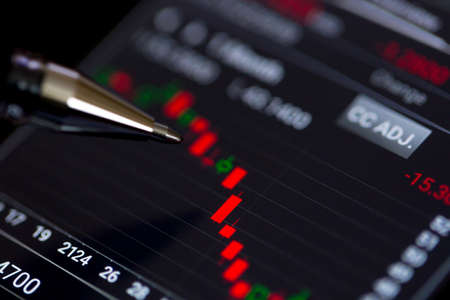 Business and trading finance contept. Stock exchange market chart view on smart phone screen.