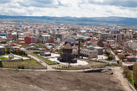 KARS, TURKEY - MAY 07, 2017 : General cityscape view of Kars city from historical Kars Castle on cloudy sky background in Kars, Eastern Anatolia Region Turkey.のeditorial素材
